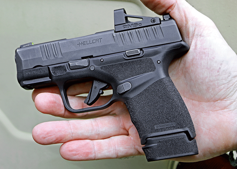 Palm-sized, the Springfield Armory Micro-Compact Hellcat still holds 14 rou...