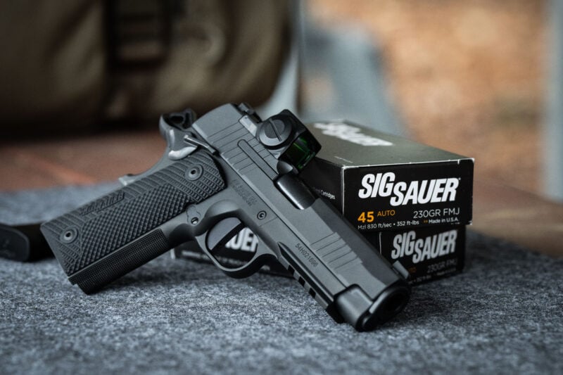 SIG SAUER 1911-XSeries with box of .45 ammunition